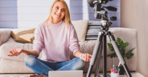 woman sitting in front of camera - how to make 6 figures with online courses